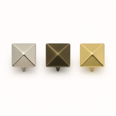 Nickel, Antique Brass, and Gold 9mm pyramid nail head nh36 displayed side by side for color comparison in leathercraft and accessory use