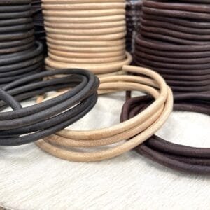 Premium round leather cords in natural and vintage tones. Sizes from 1mm to 6mm. Smooth veg-tan leather ideal for threading, beading, and lacing.