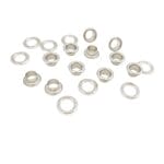 Nickel beveled grommets with washers laid out on a bright white surface for product display.-Avetco