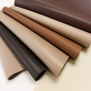 Milano cowhide leather rolls in earth tones including Rustic Brown, Starfish, Caramel Café, Vintage Khaki, Java, and Black.-Avetco