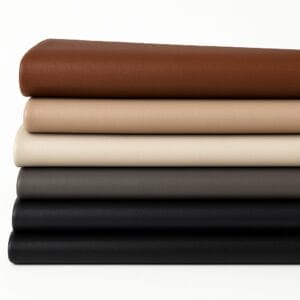 Stacked cow leather of Milano full-grain leather in a range of neutral and earthy tones including Caramel Café, Starfish, Whisper White, Charcoal Gray, and Black.-Avetco