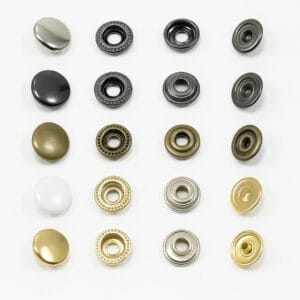 snap fastener components in multiple finishes including Nickel, Gunmetal, Antique Brass, White, and Gold