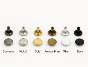 Double cap rivets in 9x6mm posts shown in Gunmetal, Nickel, Gold, Antique Brass, Silver, White, and Black finish