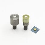 R0025 rivet die setter tools with sample rivet on denim – for hand press and kick press machines – shown on white background.