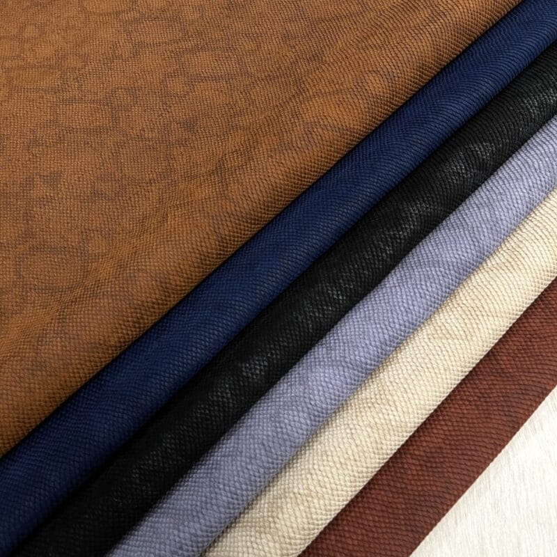 Snake embossed cow suede leather hides in six colors – Aztec, Insignia Blue, Black, Ashley Blue, Warm Sand, and Cinnamon – Avetco