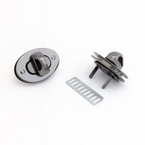 Gunmetal oval twist lock closure for handbags with front and back view including prong plate, model Y1094, Avetco.