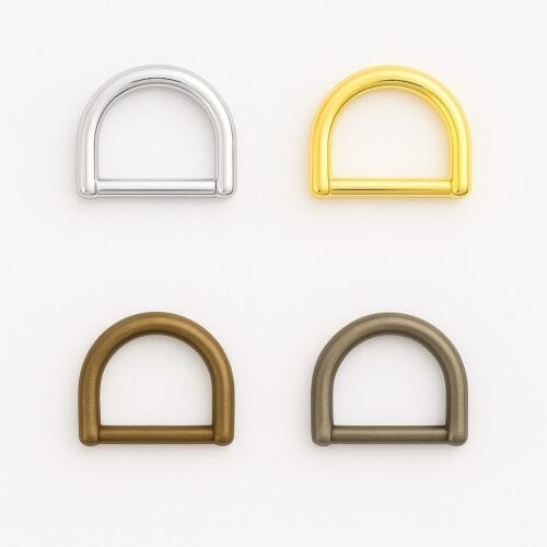 Y7456 D-Ring in four finishes: Nickel, 14k Gold, Antique Brass, and Antique Nickel on a white background.-Avetco