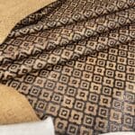 Ancestral Path embossed cow leather – tan hide linear texture