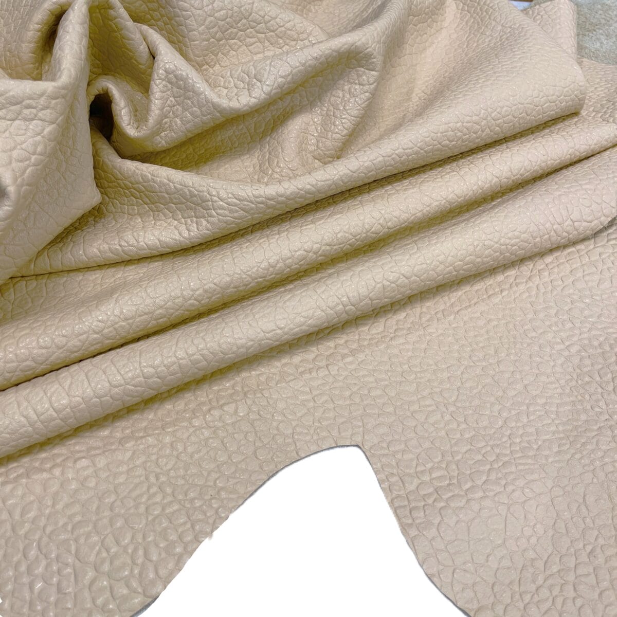 Tango Pebble Embossed Cow Leather in Sand Beige – medium temper