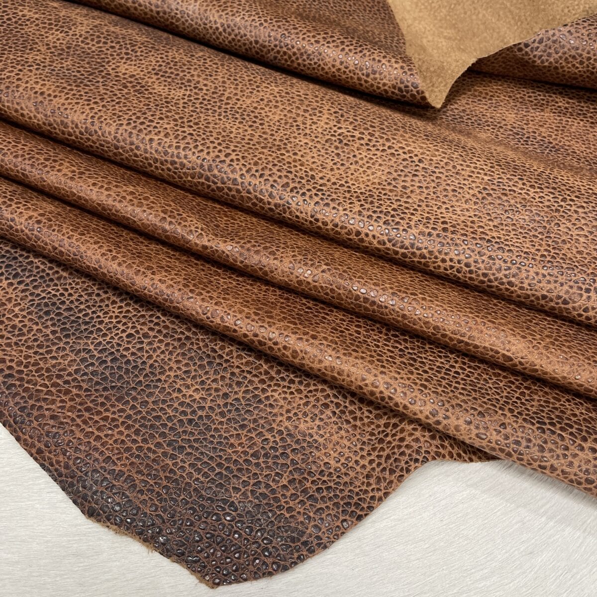 Reina Pebble Embossed Cow Leather 3 oz Cognac Pebble Texture