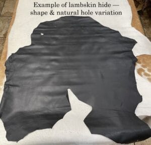 Black lambskin leather hide with natural shape and edge variation