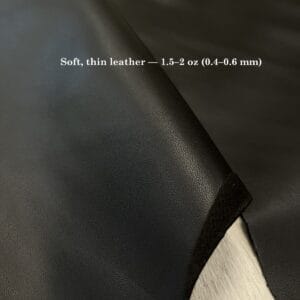 Edge view of thin black lambskin leather, 1.5–2 oz (0.4–0.6 mm)