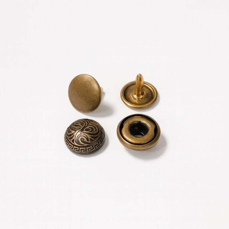 R598 11.5mm decorative dome rivets in Antique Brass finish, double cap design.