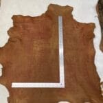 Rugged Lambskin Leather Economy Cognac color lamb hide showing natural marks and vintage patina