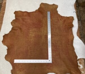 Rugged Lambskin Leather Economy Cognac color lamb hide showing natural marks and vintage patina