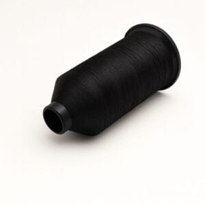 Spool of black nylon sewing thread on a white background – Avetco