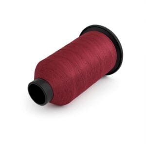 Burgundy nylon bonded thread spool with rich deep color on white background – Avetco