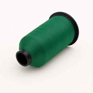 Deep green nylon thread spool on white background – Avetco B33 B69