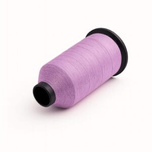 Lavender nylon bonded sewing thread spool on a white background – Avetco