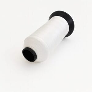 Spool of white nylon sewing thread on a white background – Avetco